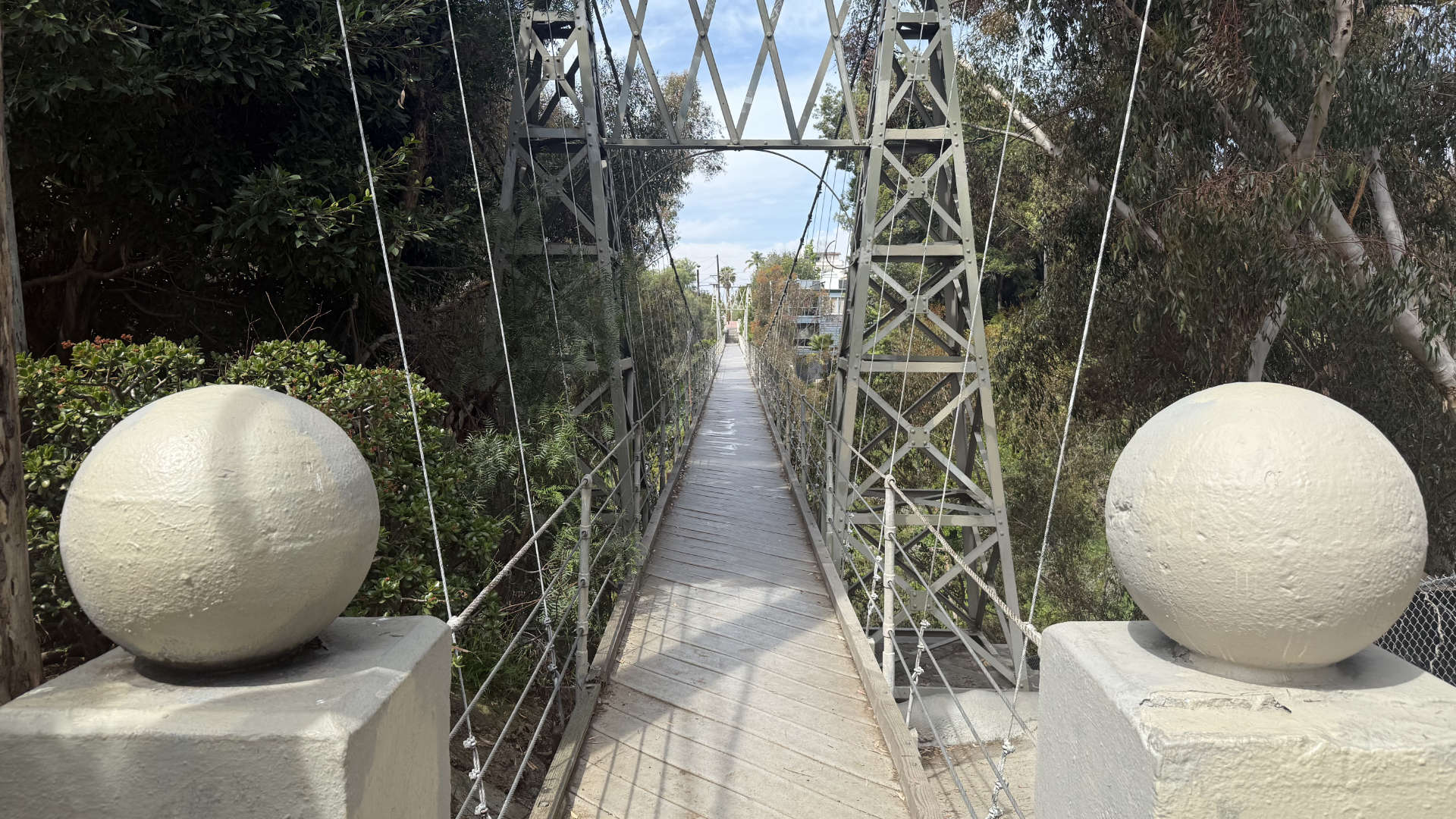 The Spruce Street Suspension Bridge entrance, a key stop on the 7 Bridge Hike