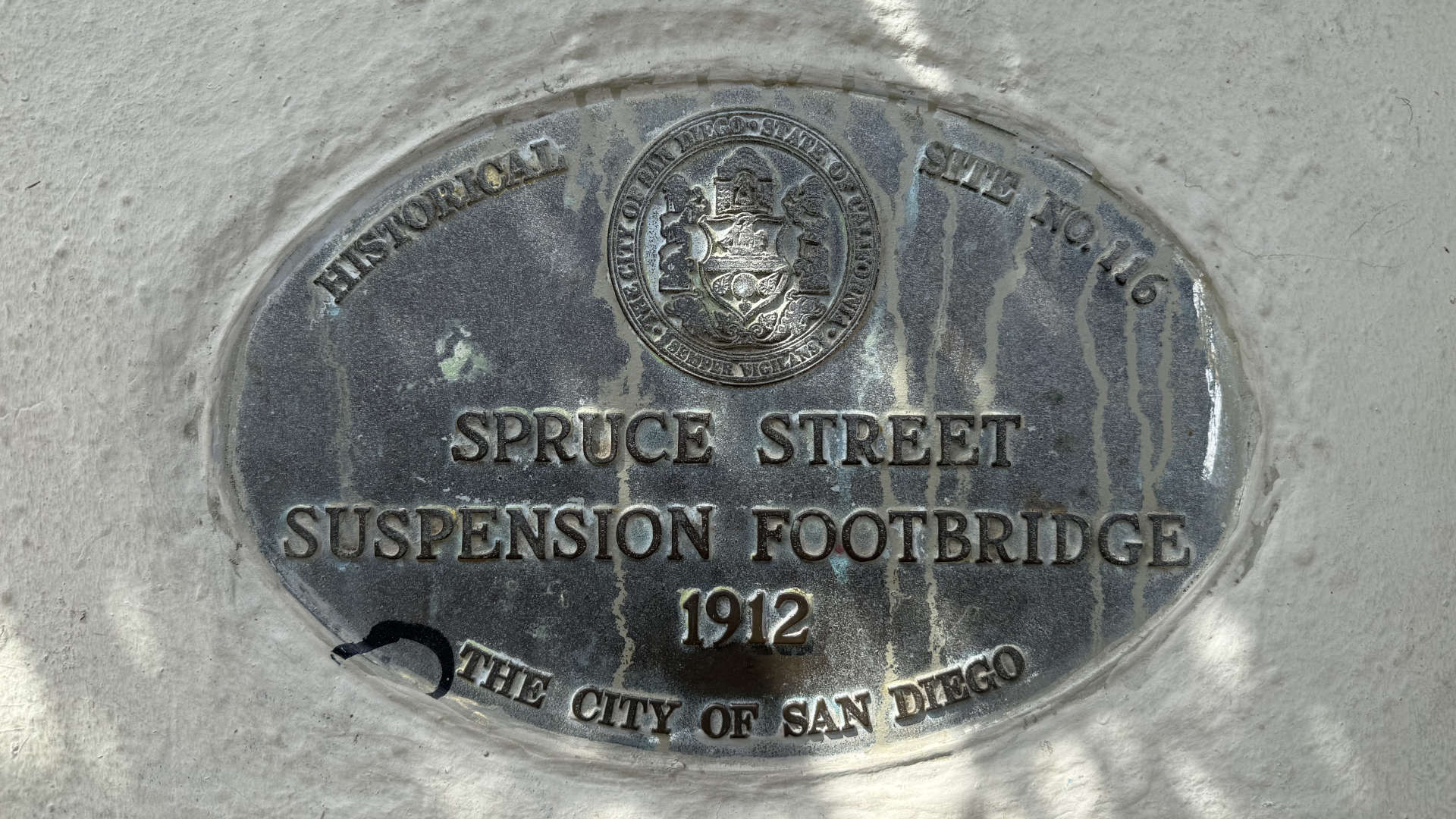Historical designation plaque for the Spruce Street Suspension Bridge